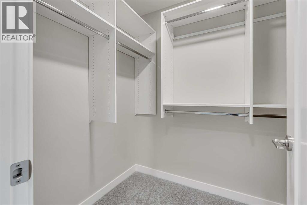 27 Creekside Rise SW, Calgary, Alberta  T2X 5V9 - Photo 29 - A2338861