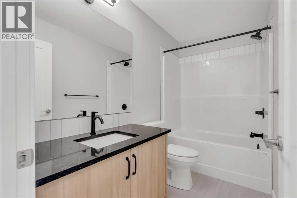 27 Creekside Rise SW, Calgary, Alberta  T2X 5V9 - Photo 34 - A2338861