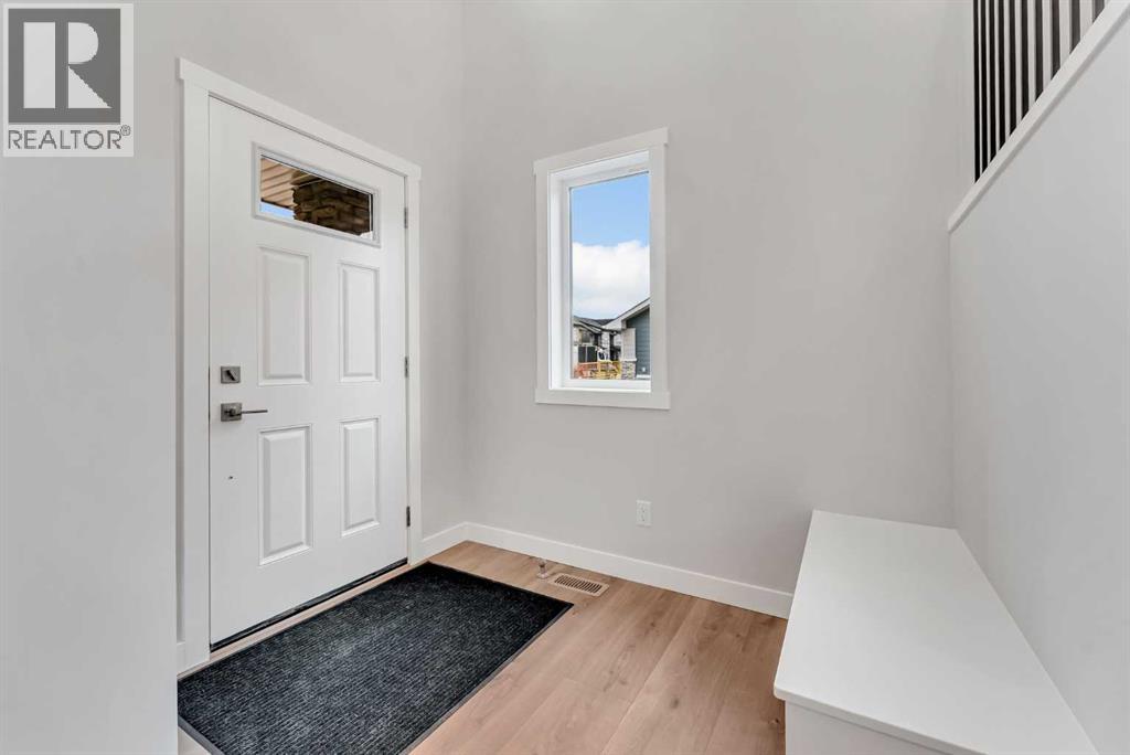 27 Creekside Rise SW, Calgary, Alberta  T2X 5V9 - Photo 2 - A2338861