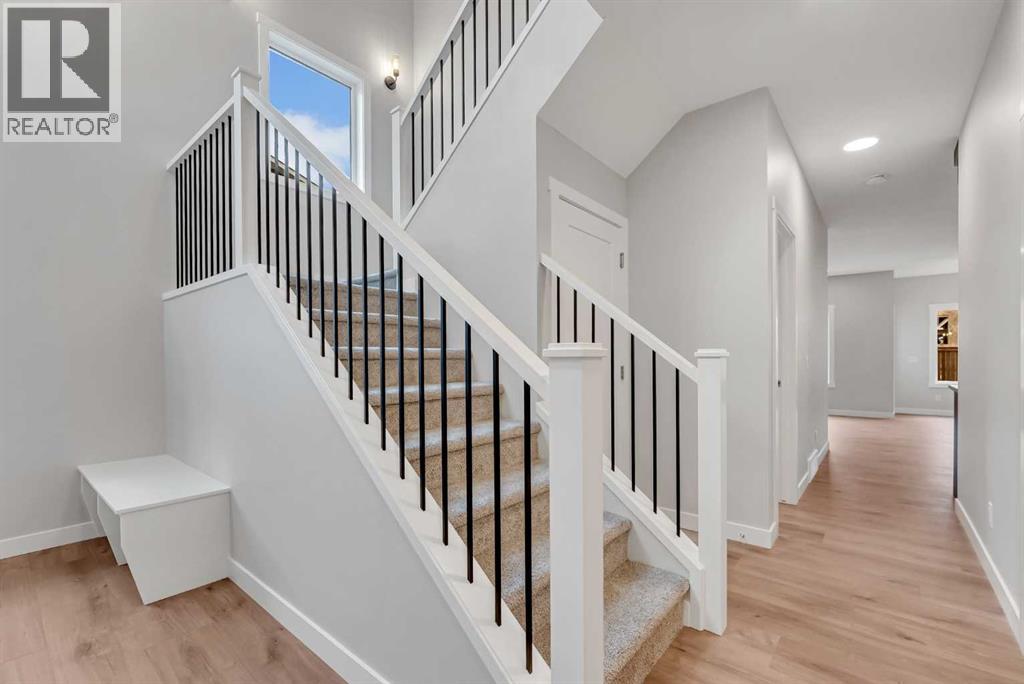27 Creekside Rise SW, Calgary, Alberta  T2X 5V9 - Photo 4 - A2338861