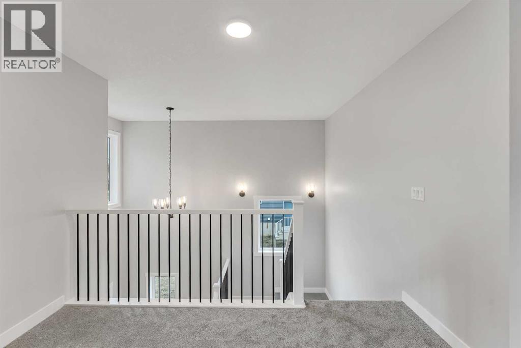 27 Creekside Rise SW, Calgary, Alberta  T2X 5V9 - Photo 21 - A2338861