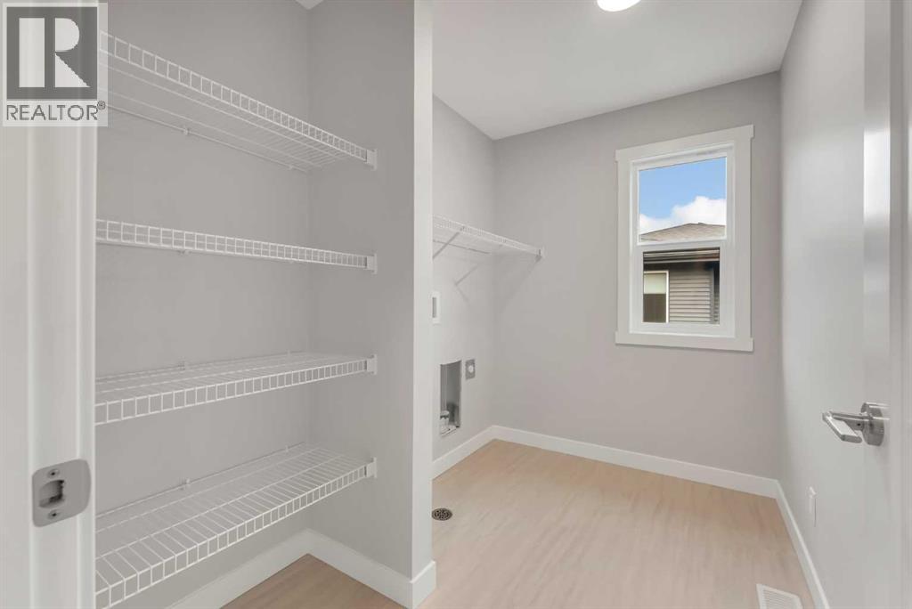 27 Creekside Rise SW, Calgary, Alberta  T2X 5V9 - Photo 35 - A2338861