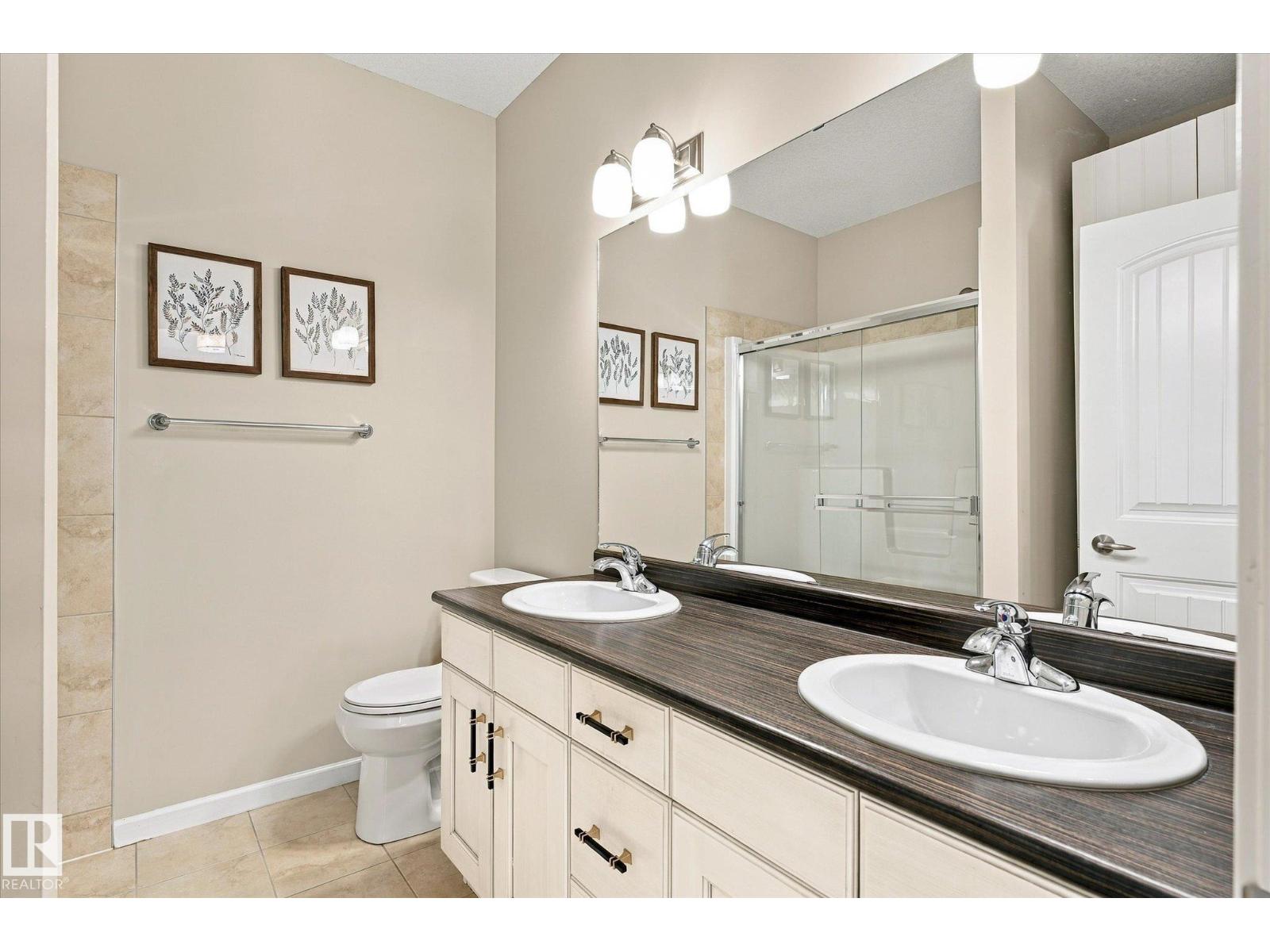 #306 6083 MAYNARD WY NW