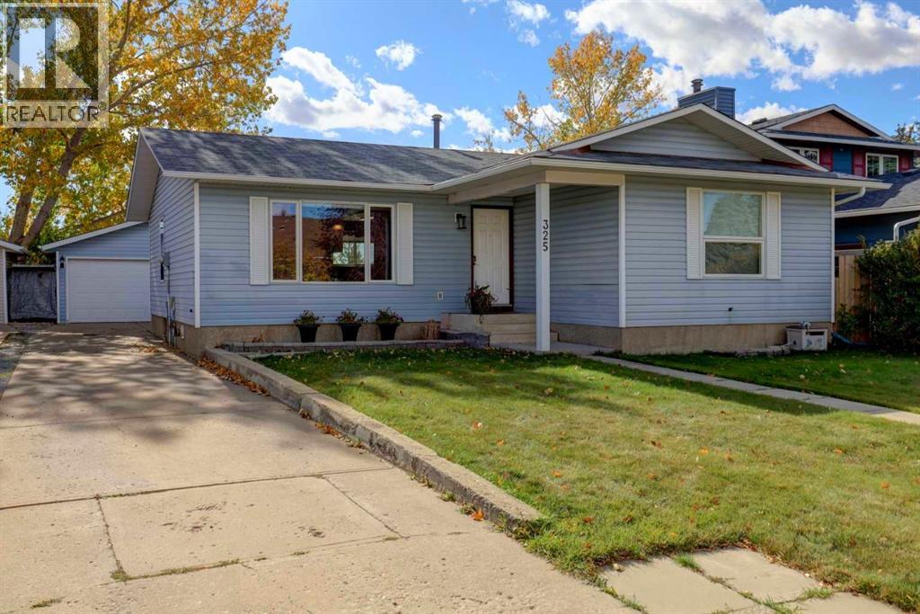 325 Flett Drive NE, Airdrie, Alberta  T4B 1N1 - Photo 2 - A2348096