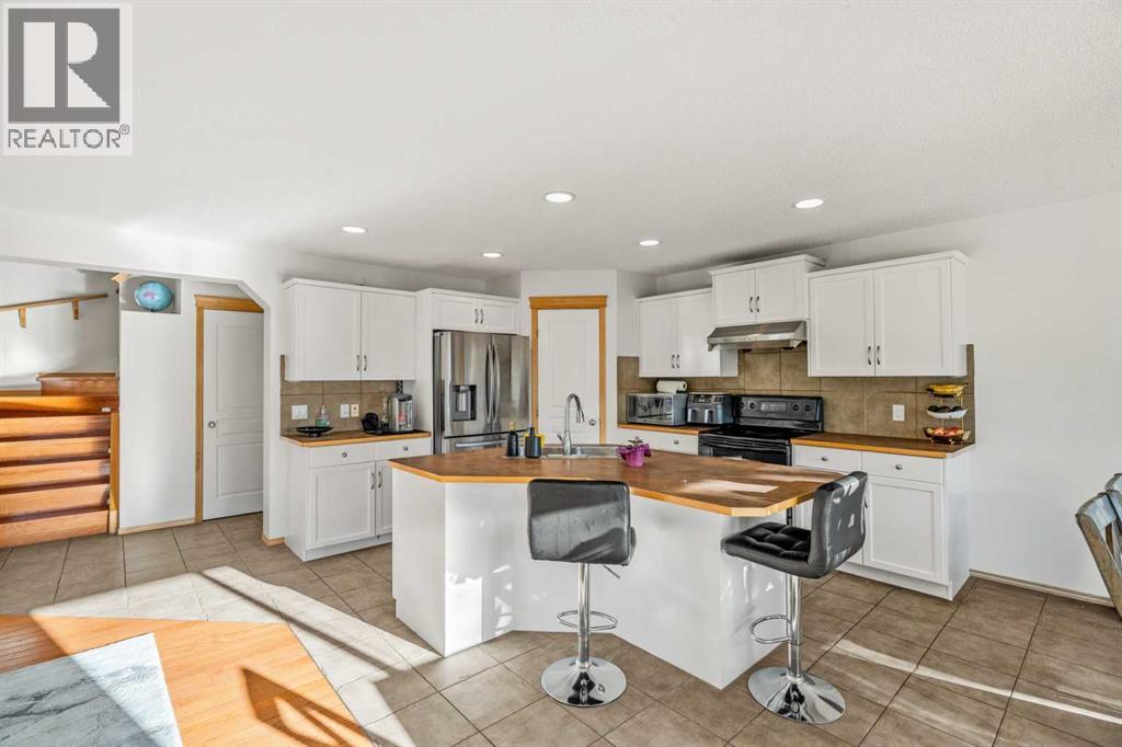 116 Tuscany Ravine Crescent Nw, Calgary, Alberta T3L 2X2 - Photo 7 - A2354016