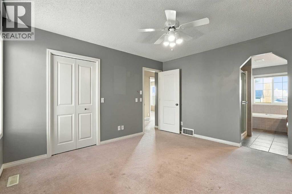 707 Tuscany Drive Nw, Calgary, Alberta  T3L 3A7 - Photo 25 - A2354222