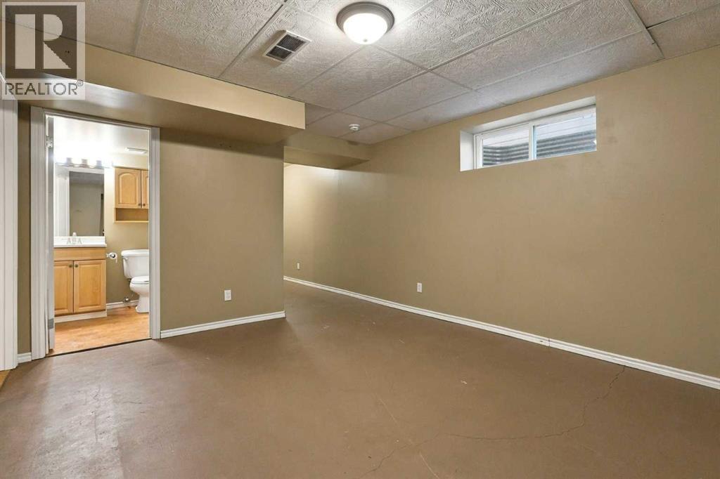 707 Tuscany Drive Nw, Calgary, Alberta  T3L 3A7 - Photo 35 - A2354222