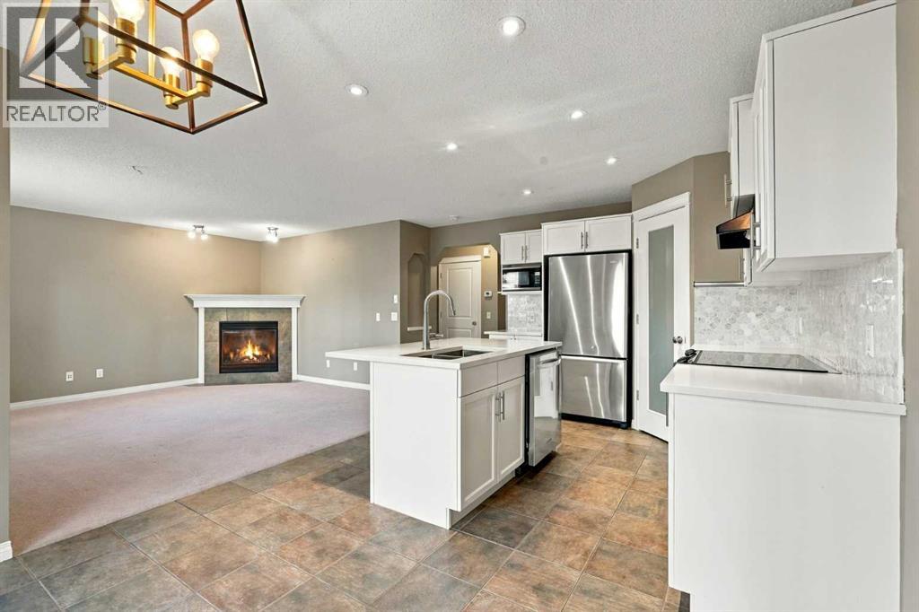 707 Tuscany Drive Nw, Calgary, Alberta  T3L 3A7 - Photo 5 - A2354222