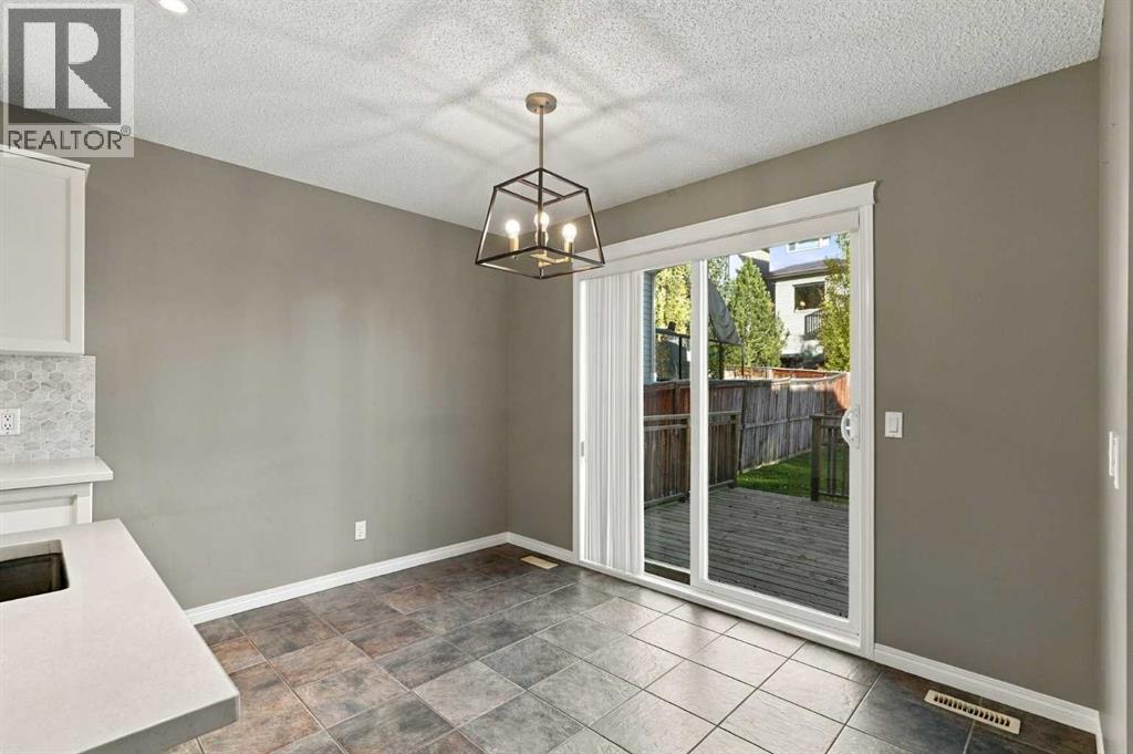 707 Tuscany Drive Nw, Calgary, Alberta  T3L 3A7 - Photo 6 - A2354222
