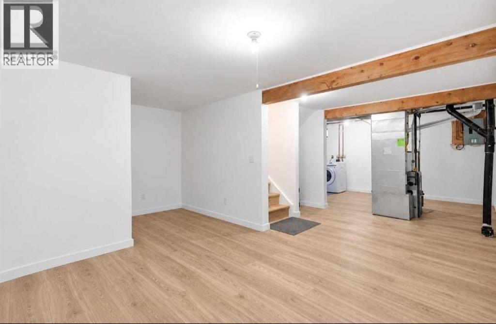 135 Woodsman Lane Sw, Calgary, Alberta  T2W 4Z5 - Photo 21 - A2339854