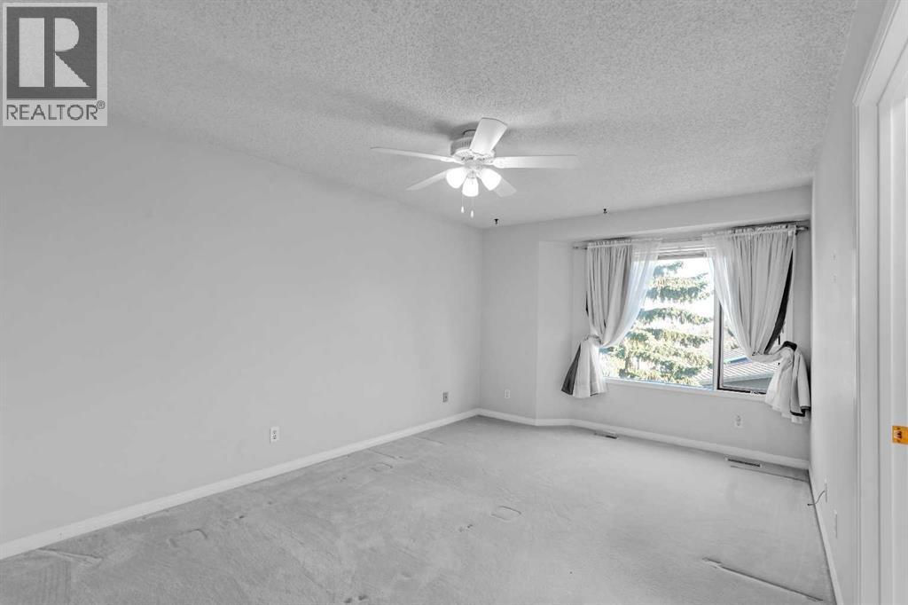 84 Strathlorne Crescent SW, Calgary, Alberta  T3H 1M8 - Photo 19 - A2353985