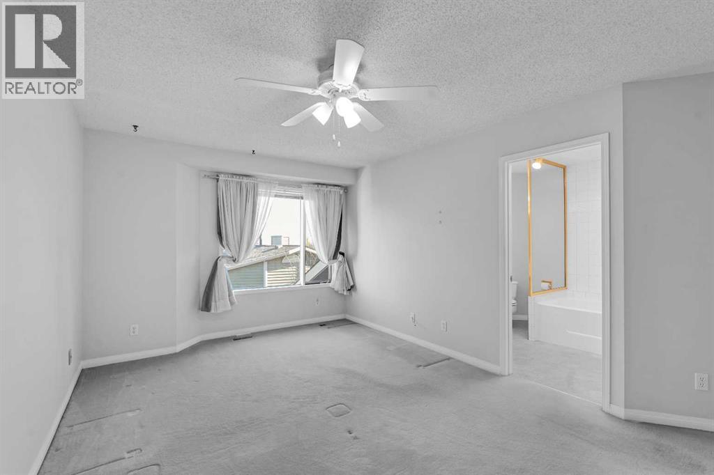 84 Strathlorne Crescent SW, Calgary, Alberta  T3H 1M8 - Photo 20 - A2353985