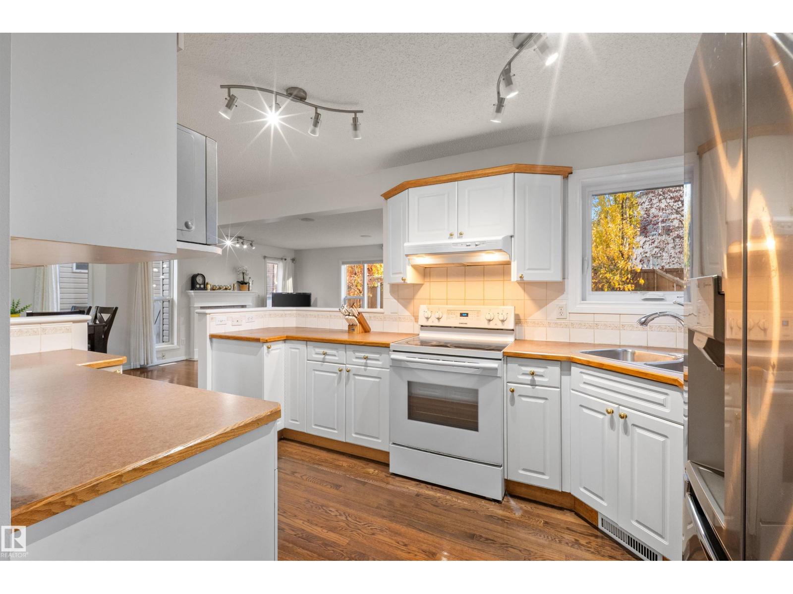305 WILD ROSE WY NW