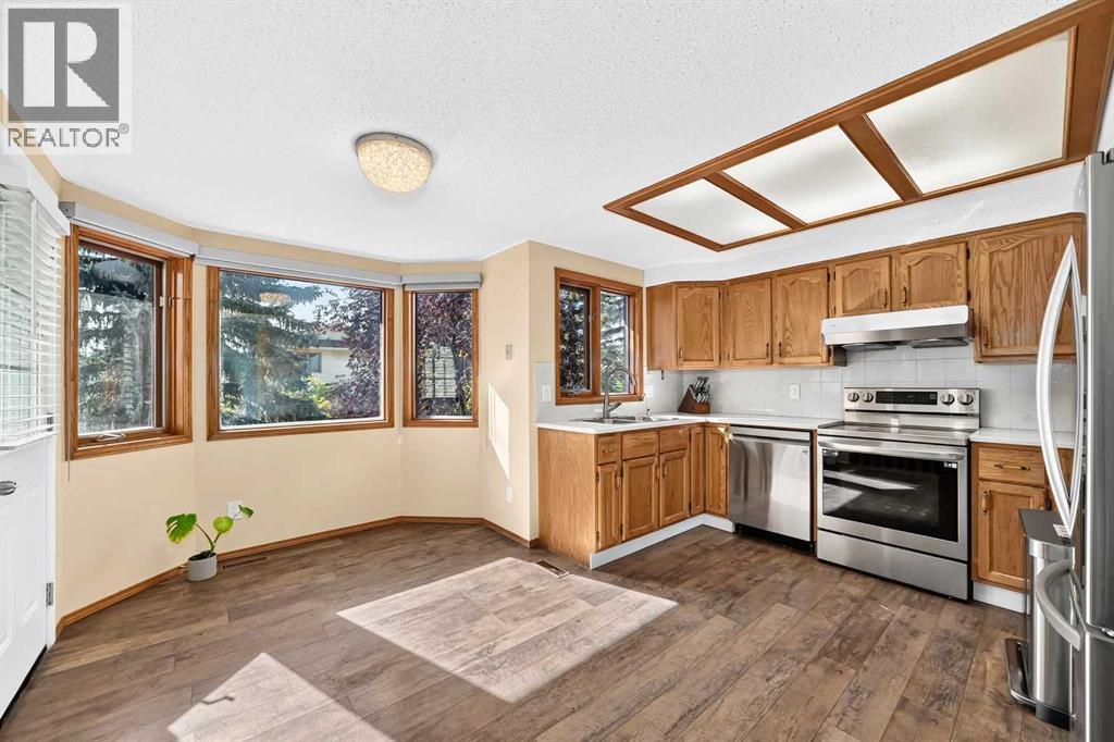 144 Hawkdale Close Nw, Calgary, Alberta  T3G 2Z9 - Photo 9 - A2349076