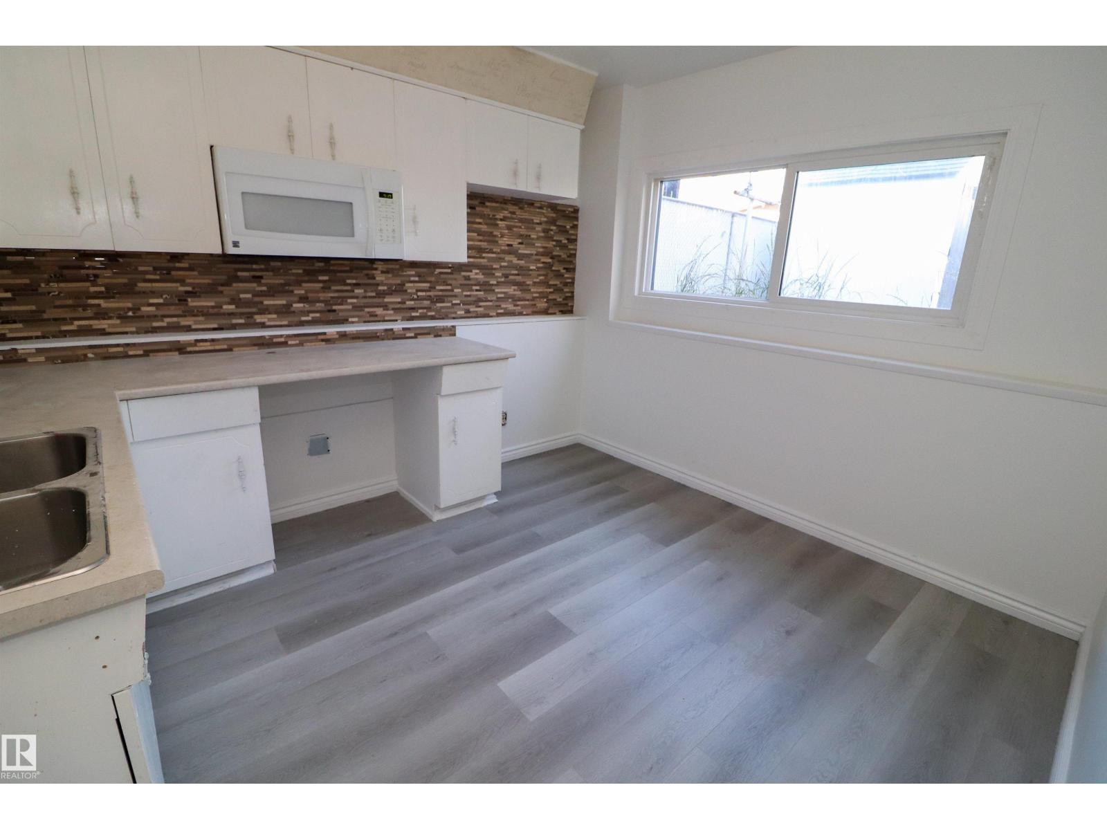 10118 &amp; 10120 121 AV NW