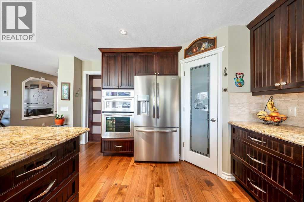 7 Springbank View SW, Calgary, Alberta  T3H 4J5 - Photo 14 - A2353152
