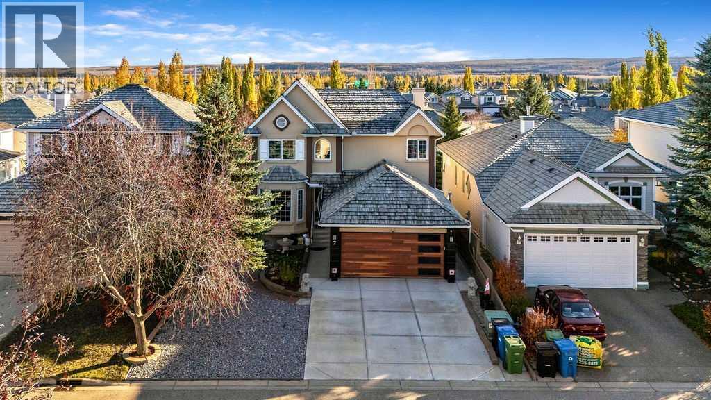7 Springbank View SW, Calgary, Alberta  T3H 4J5 - Photo 1 - A2353152