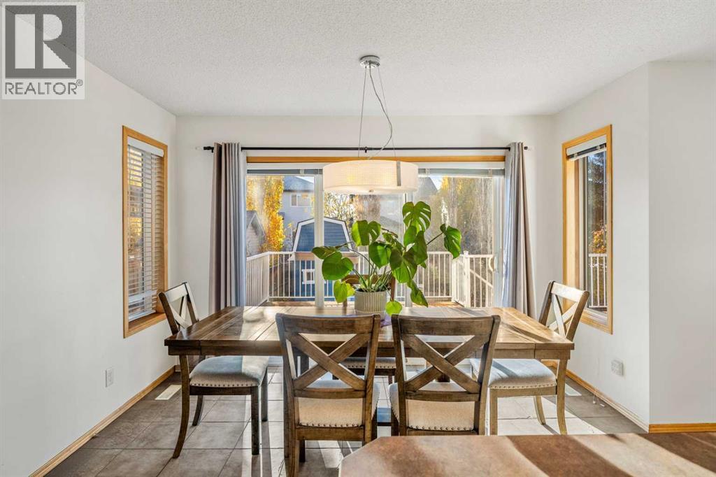 116 Tuscany Ravine Crescent NW, Calgary, Alberta  T3L 2X2 - Photo 6 - A2354016