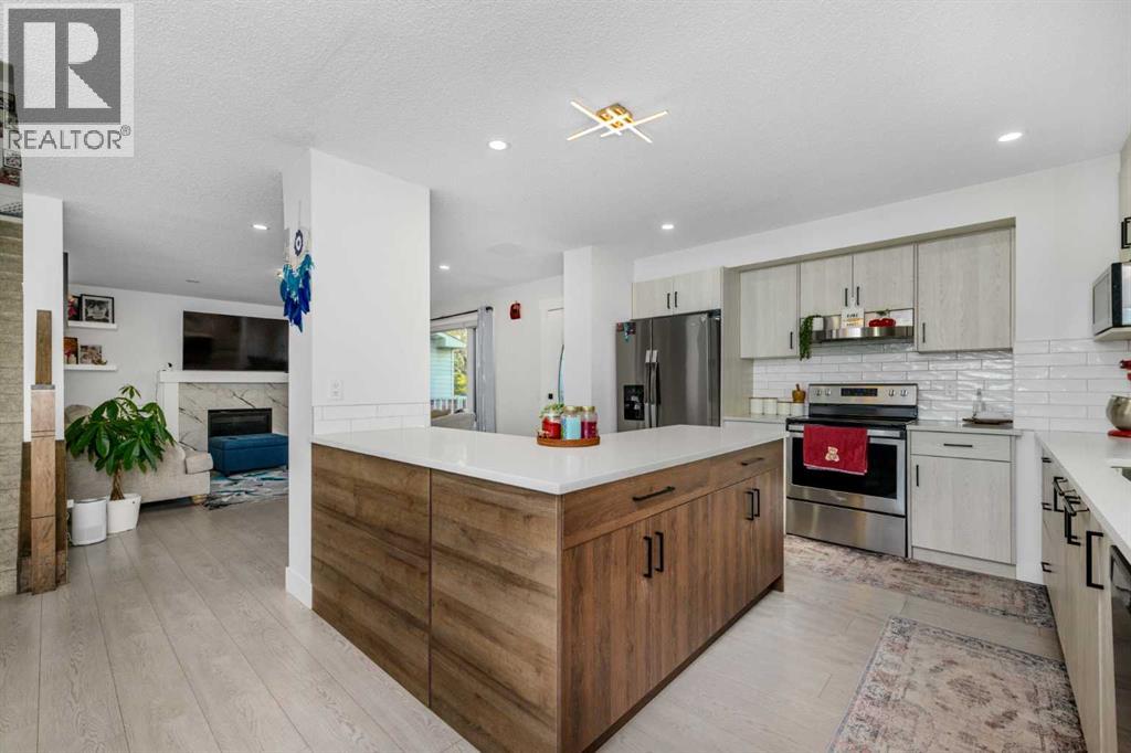 835 Coventry Drive Ne, Calgary, Alberta  T3K 4G2 - Photo 3 - A2354303