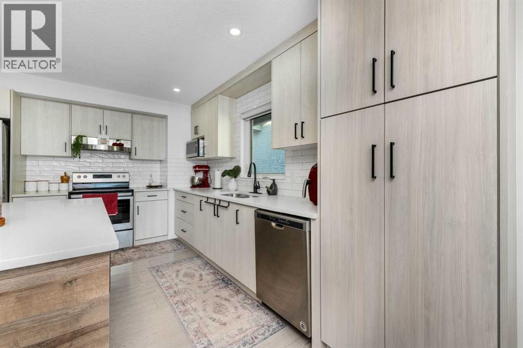 835 Coventry Drive Ne, Calgary, Alberta  T3K 4G2 - Photo 4 - A2354303
