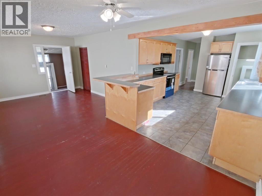 107 7 Avenue N, Vulcan, Alberta  T0L 2B0 - Photo 8 - A2352633