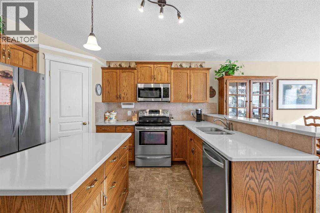 3 Tuscany Meadows Crescent NW, Calgary, Alberta  T3L 2T9 - Photo 3 - A2353618