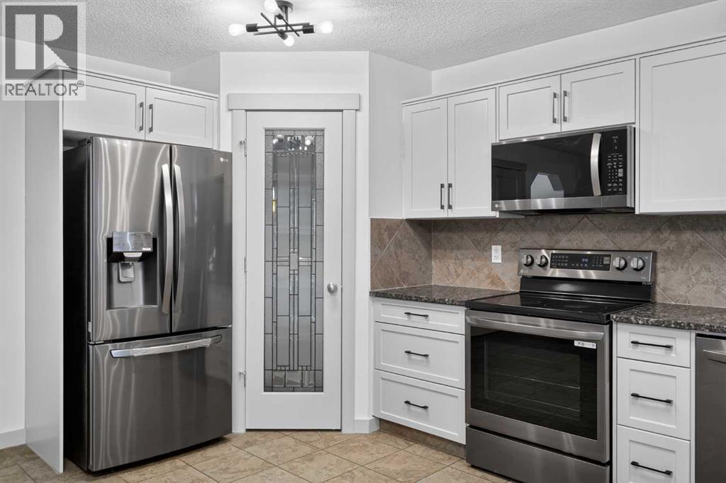 130 Panamount Road Nw, Calgary, Alberta  T3K 0H6 - Photo 5 - A2351924