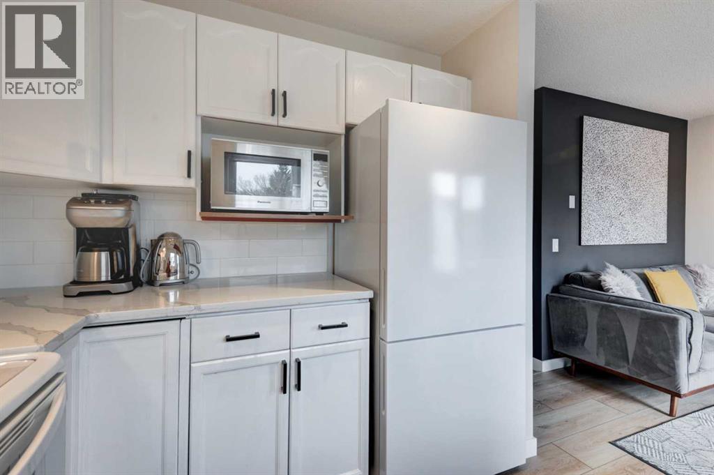 31 Inglewood Cove Se, Calgary, Alberta  T2G 5K4 - Photo 7 - A2354324
