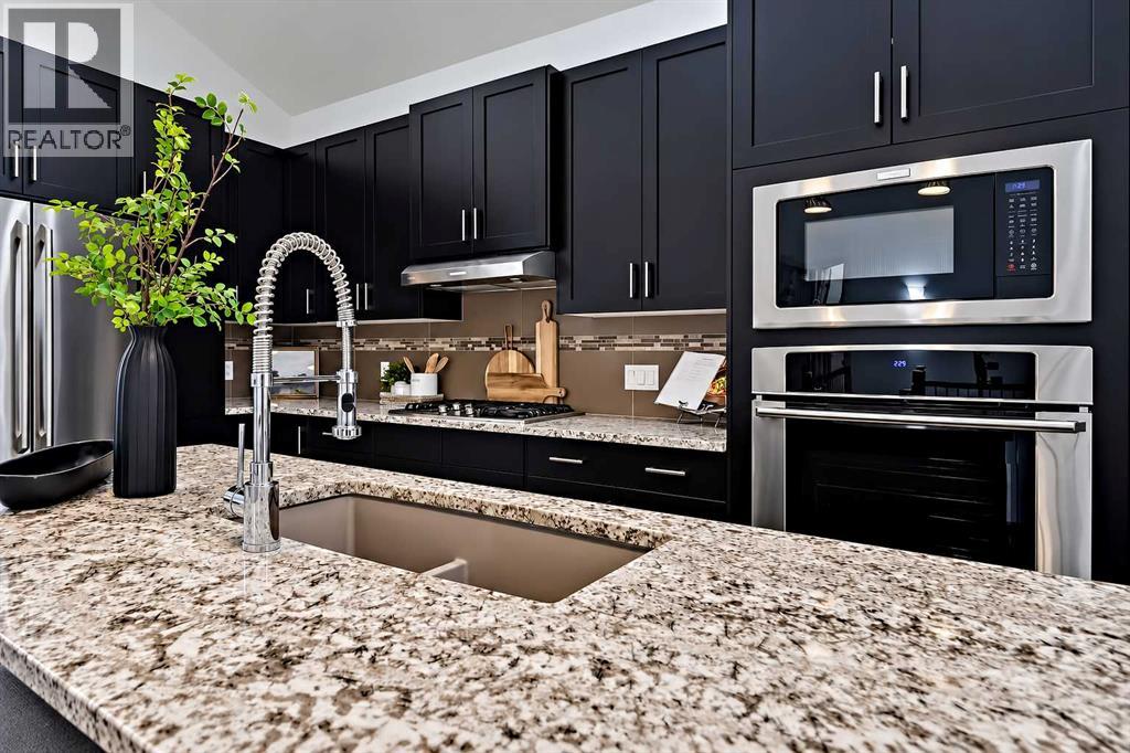 63 Cortina Villas Sw, Calgary, Alberta  T3H 0W8 - Photo 8 - A2354228