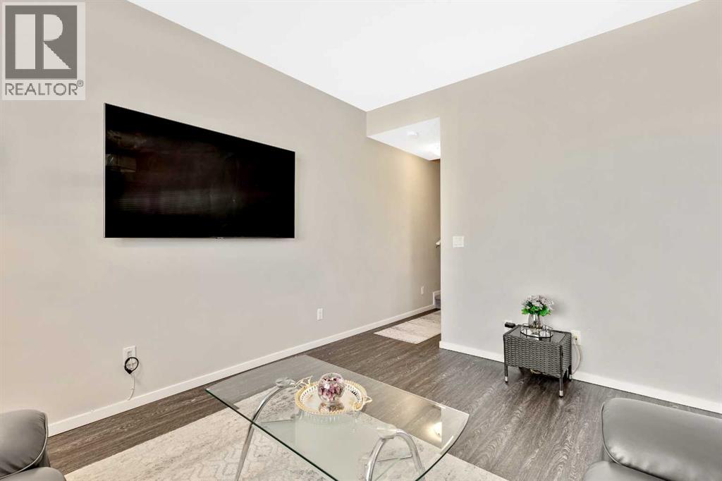 203, 245 Redstone Walk NE
