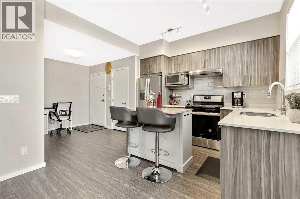 203, 245 Redstone Walk NE