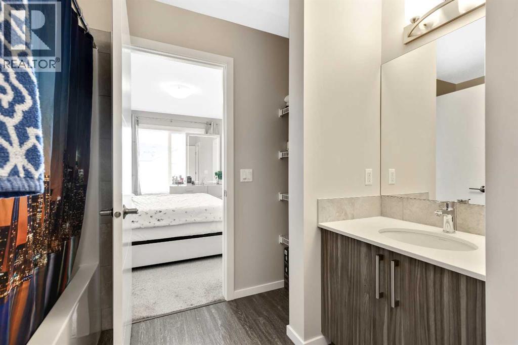 203, 245 Redstone Walk NE