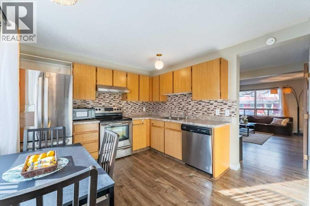 552 Queenston Gardens SE, Calgary, Alberta  T2J 6R2 - Photo 8 - A2354036