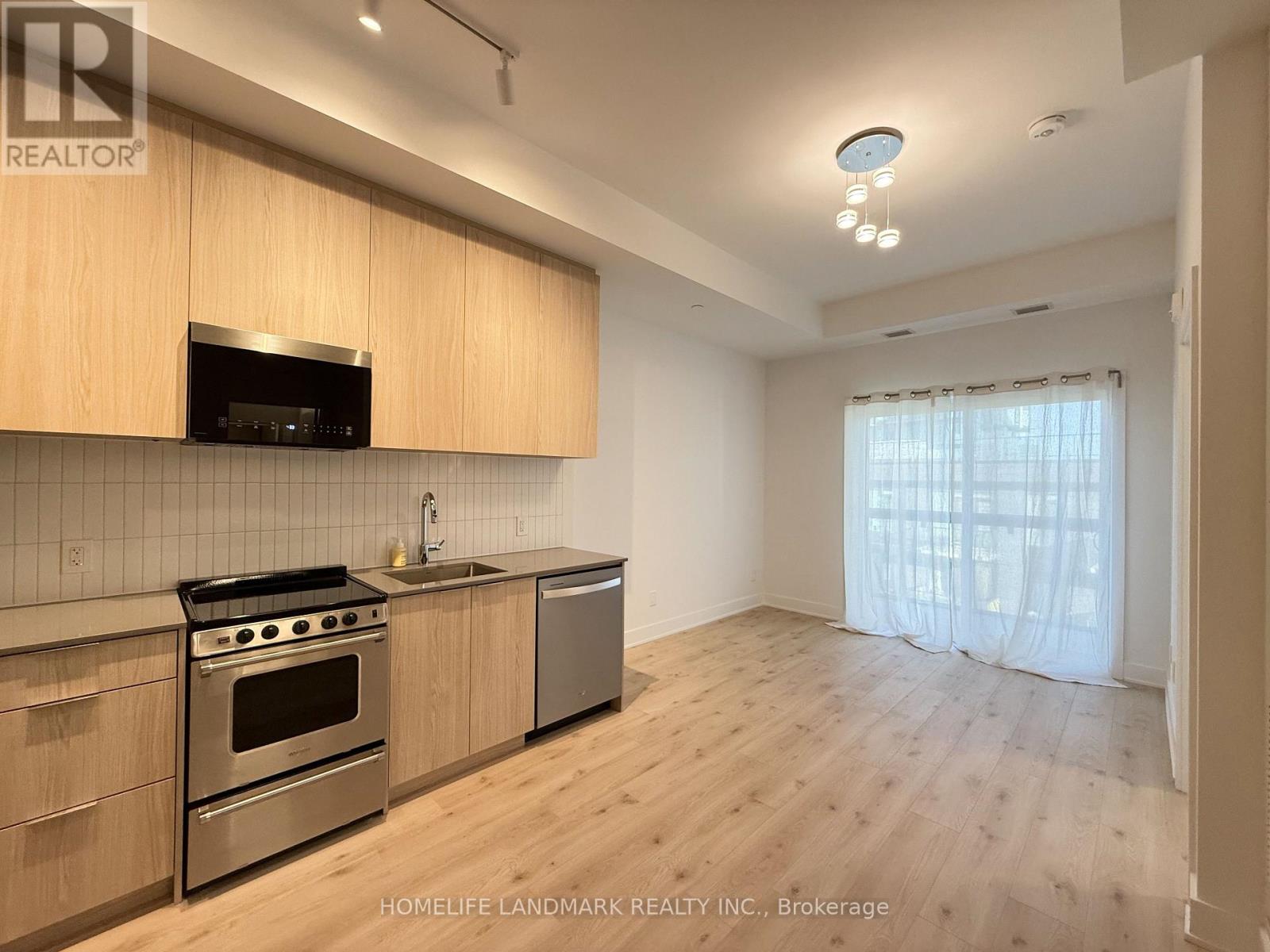 713 - 3008 William Cutmore Boulevard, Oakville, Ontario  L6H 8E7 - Photo 2 - W13885498