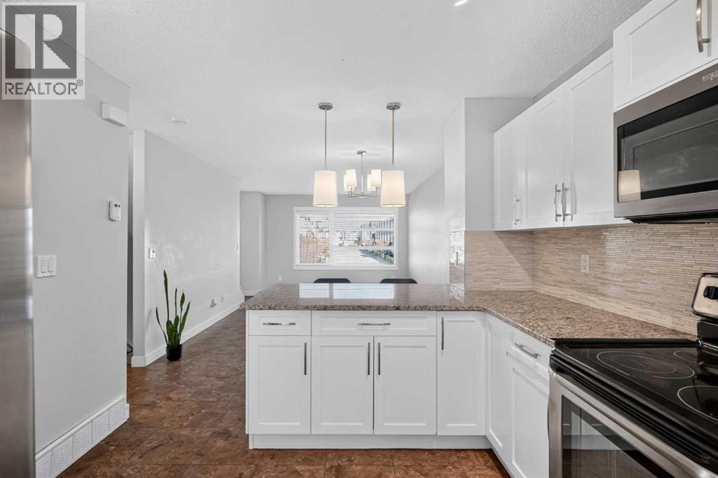 508 Covecreek Circle Ne, Calgary, Alberta T3K 0W6 - Photo 10 - A2353600