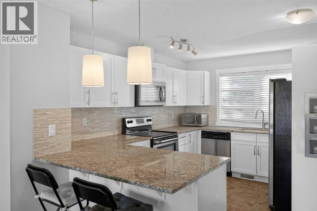 508 Covecreek Circle Ne, Calgary, Alberta T3K 0W6 - Photo 2 - A2353600