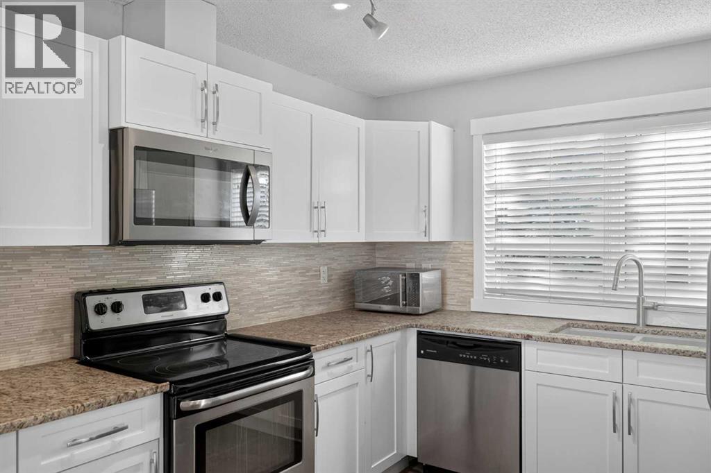 508 Covecreek Circle Ne, Calgary, Alberta T3K 0W6 - Photo 8 - A2353600