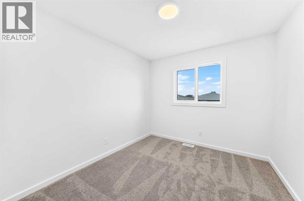 84 Creekside Rise SW, Calgary, Alberta  T2X 6G8 - Photo 32 - A2353868