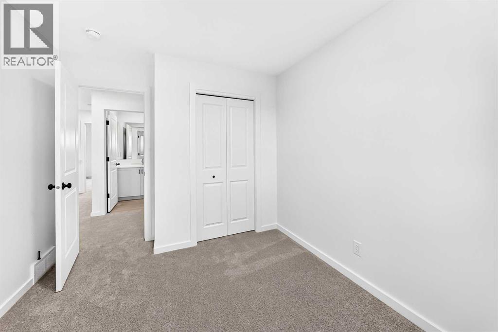 84 Creekside Rise SW, Calgary, Alberta  T2X 6G8 - Photo 33 - A2353868