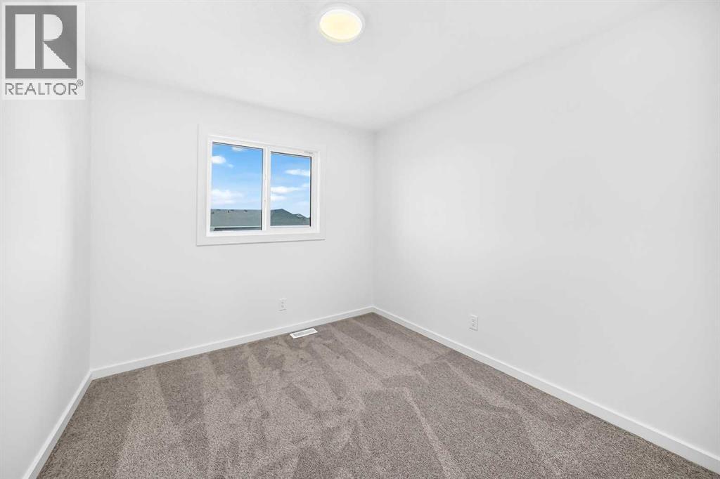 84 Creekside Rise SW, Calgary, Alberta  T2X 6G8 - Photo 36 - A2353868