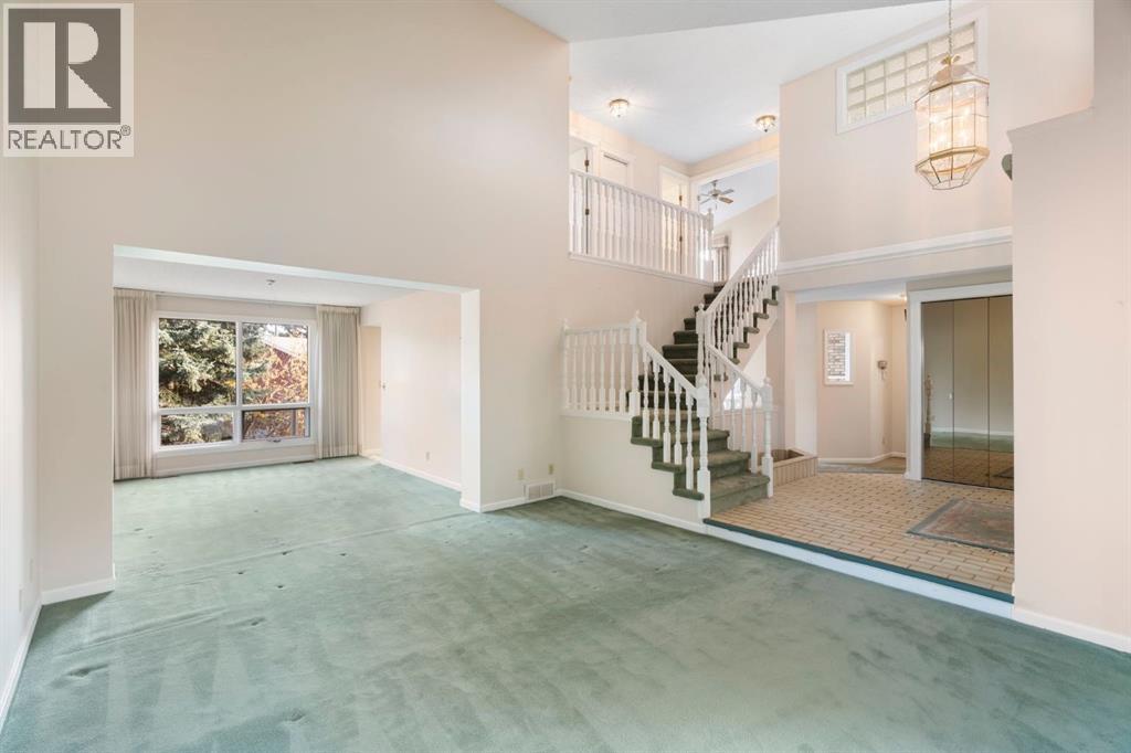 59 Stranraer Place SW, Calgary, Alberta  T3H 1H5 - Photo 7 - A2354513