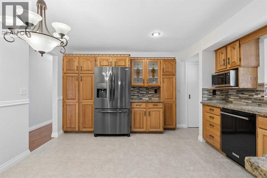 808 Stonehaven Road Sw, Calgary, Alberta  T2W 0P6 - Photo 10 - A2353771