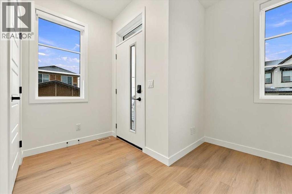 121 Amblefield Heights NW, Calgary, Alberta  T3P 2K1 - Photo 4 - A2340986