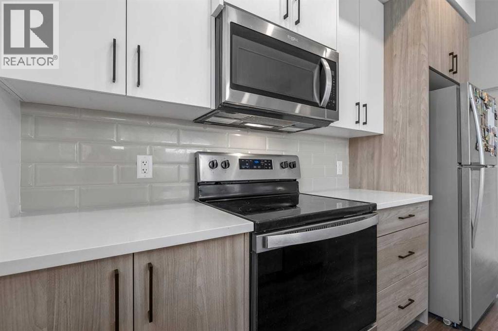 122 Spring Creek Common Sw, Calgary, Alberta  T3H 6E2 - Photo 8 - A2354291