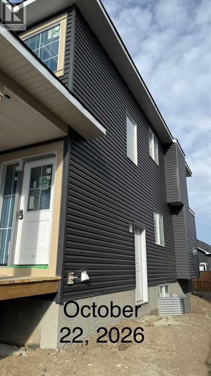 1431 Scarlett Ranch Boulevard, Carstairs, Alberta  T0M 0N0 - Photo 2 - A2338803