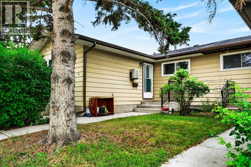 53 Queen Isabella Close Se, Calgary, Alberta  T2J 3R2 - Photo 3 - A2337468