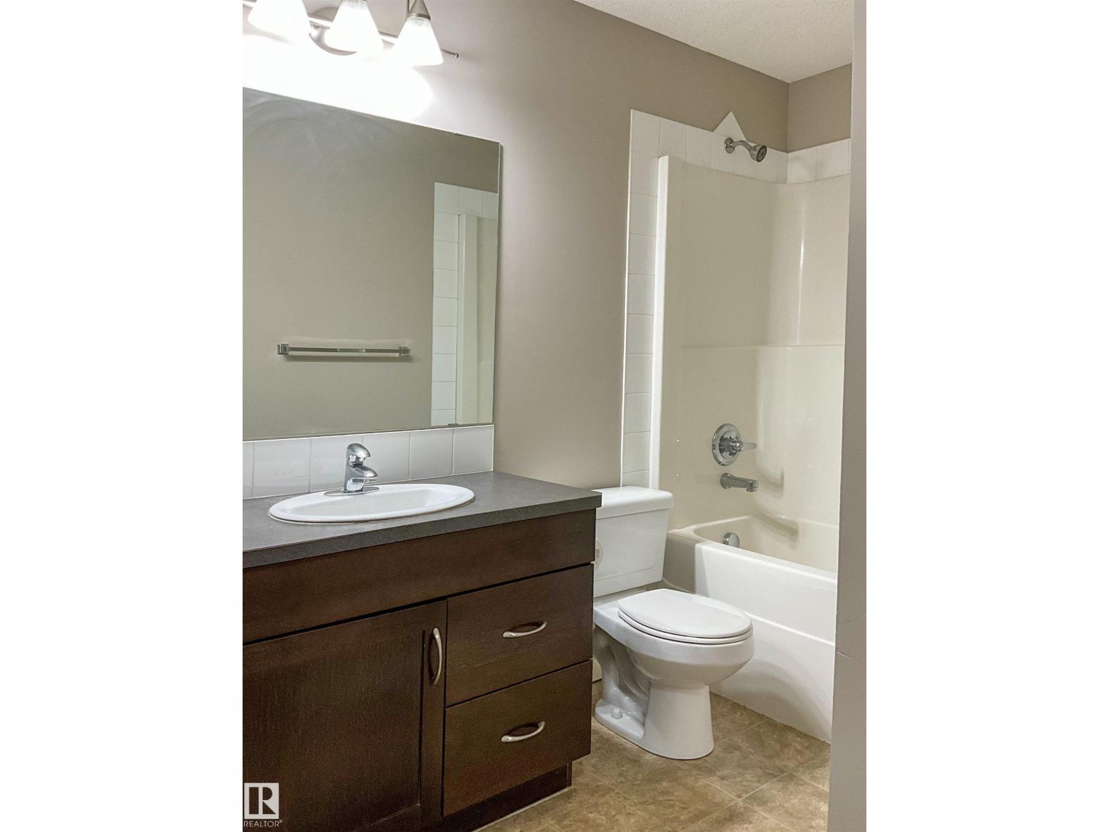 #207 392 SILVER BERRY RD NW