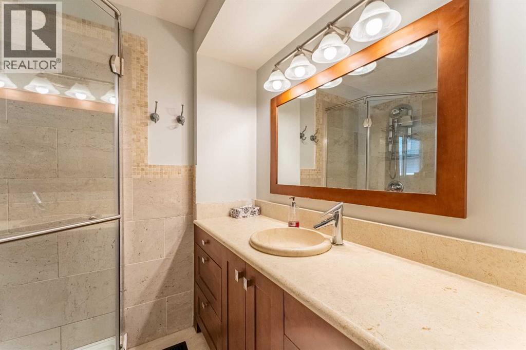 208 Woodpark Place Sw, Calgary, Alberta  T2M 2S5 - Photo 19 - A2349698
