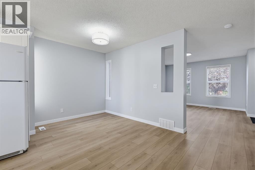 220 Covemeadow Road NE, Calgary, Alberta  T3K 6E7 - Photo 11 - A2352385