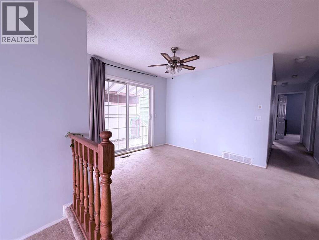 39 Tararidge Court Ne, Calgary, Alberta  T3J 2P9 - Photo 4 - A2353234